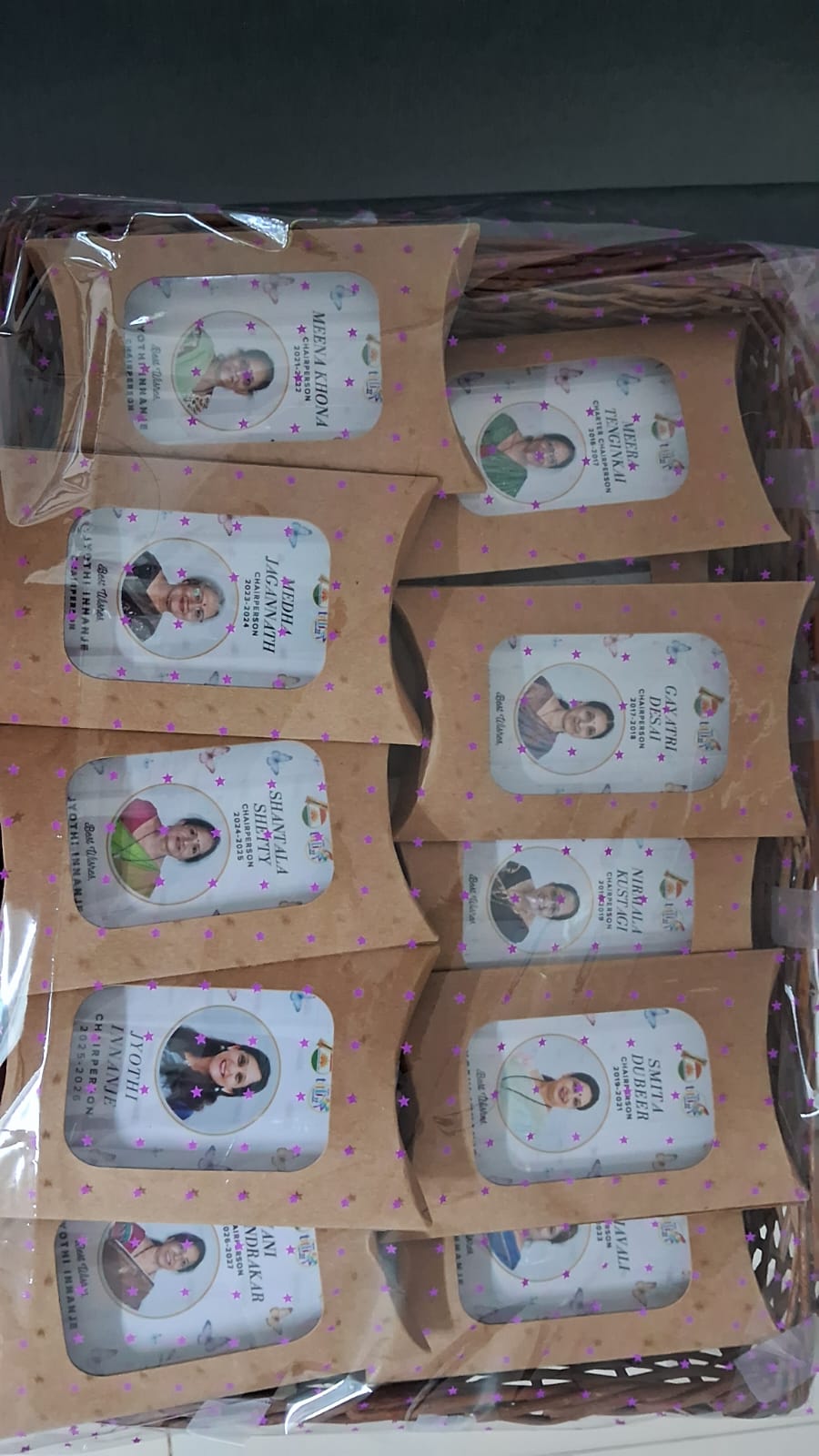 A basket of individually boxed custom photo magnets ready for delivery